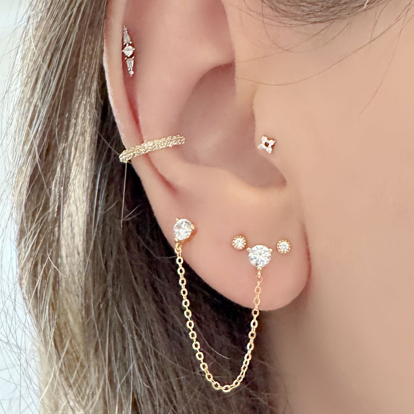 Pavé Gemstone Gold Ear Cuff & Double Piercing Stud Earring on Model, Two of Most Fine Jewelry