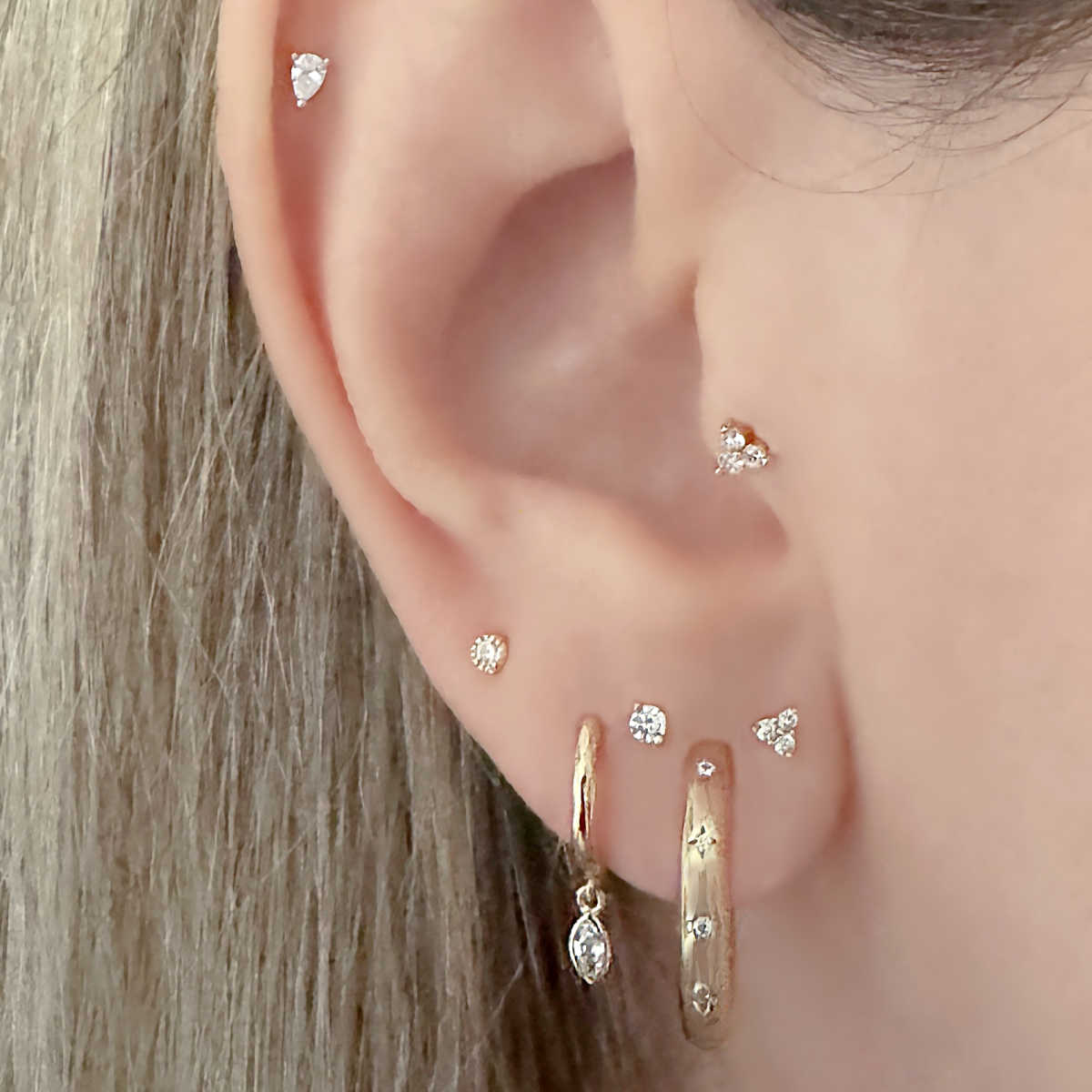 Trinity Screw Back Earring | Gold Ball Back Cartilage Stud on Model
