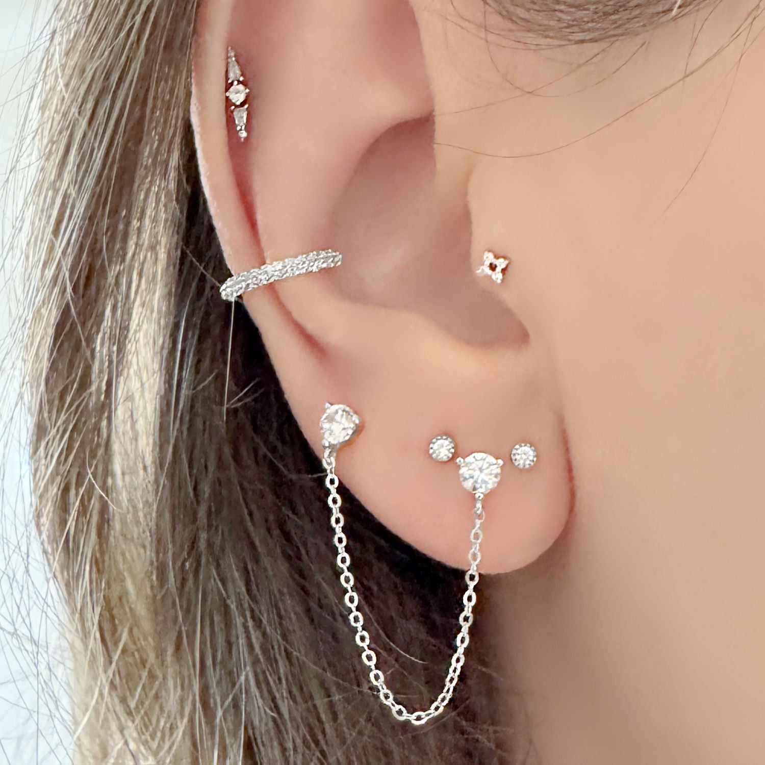 Pavé Gemstone White Gold Ear Cuff & Double Piercing Stud Earring on Model, Two of Most Fine Jewelry