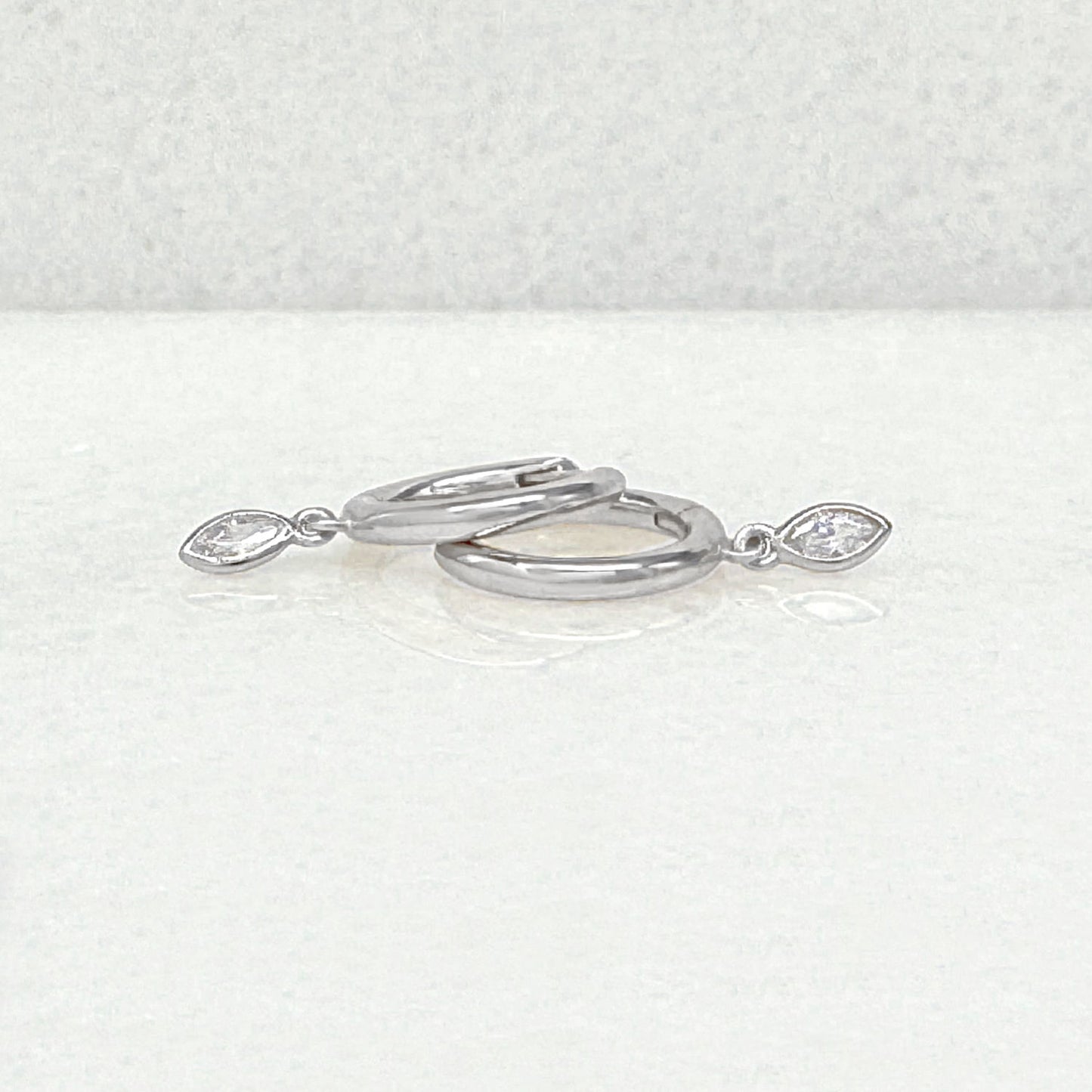 Silver Huggie Earrings with Charm