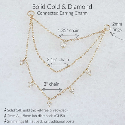 Gold and diamond connected three chain earring charm shown on a light textured background with labeled chain lengths and ring measurements.