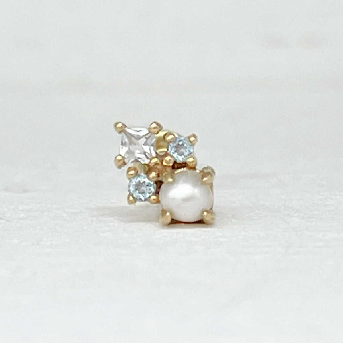 Pearl Stud Earrings with Blue Topaz | 14k Gold Cartilage Studs from Two of Most