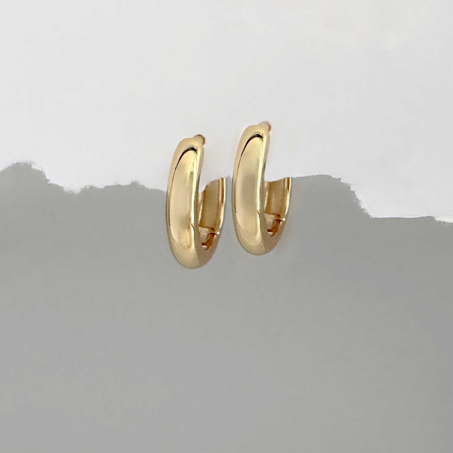 Pair of small gold hoop huggie earrings for helix or lobe piercings