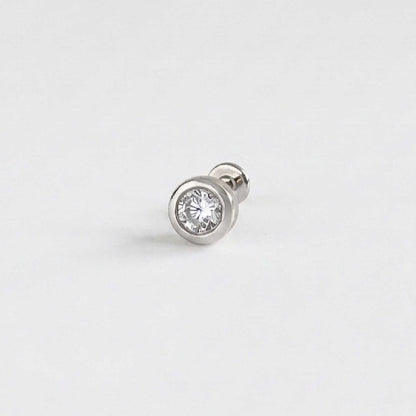 A single 14k solid white gold stud flat back earring with a bezel-set diamond gemstone, shown on a clean, light gray background.