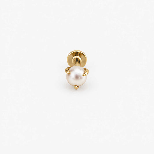 A single 14k gold flat back stud earring featuring a round, lustrous white pearl held in a prong setting, shown against a plain white background.