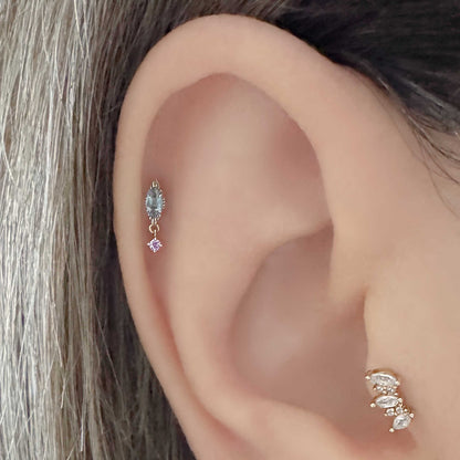 Woman Wearing 14k, Blue Topaz and Amethyst Dangle Flat Back Helix Earring