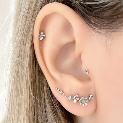 Blue Gemstone & Gold Flat Back Cartilage Piercing Earrings on Model