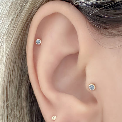 Woman Wearing Blue Topaz Flat Back Earrings in Tragus & Helix, 14k Gold  Cartilage Piercing Jewelry from Two of Most