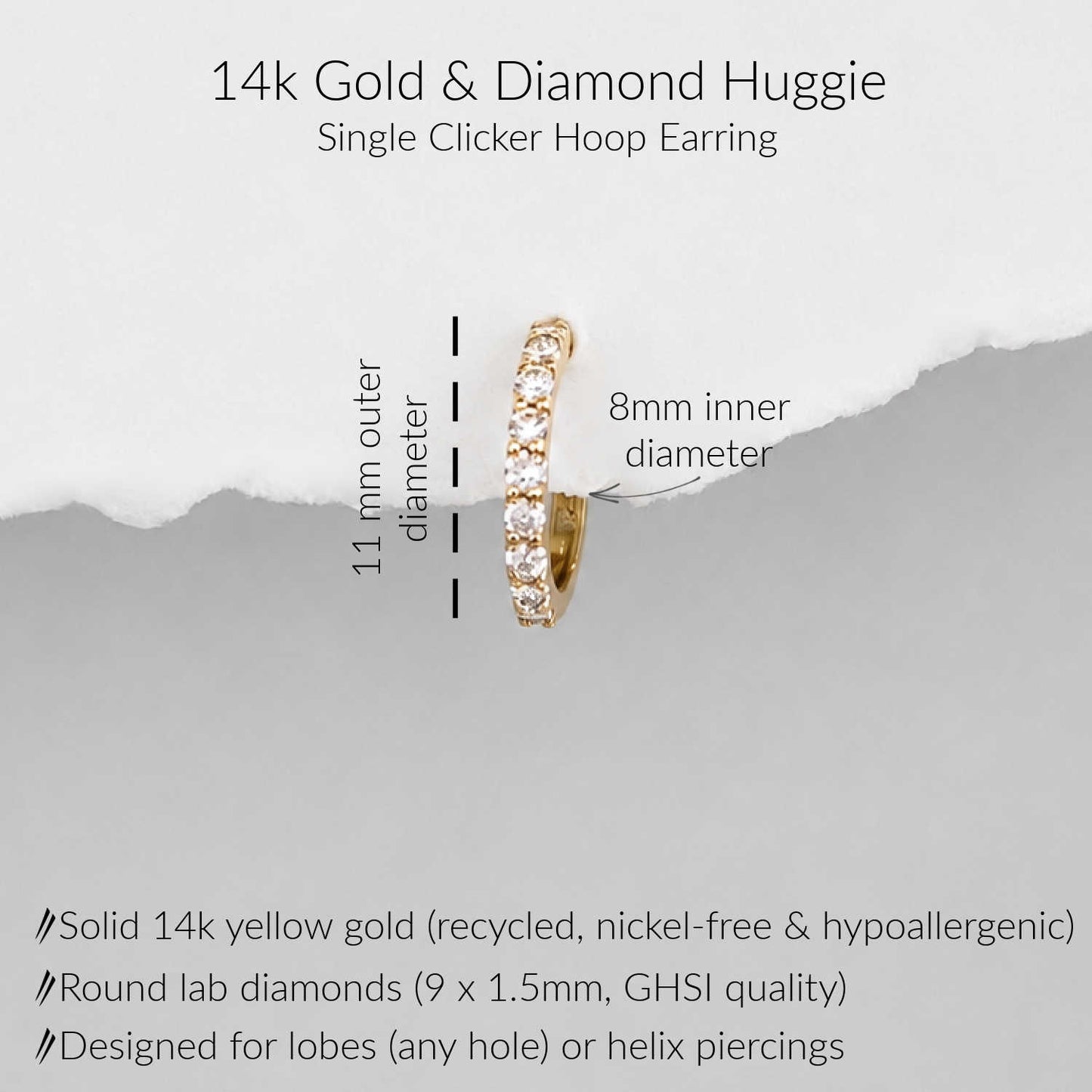 A 14k yellow gold single-clicker huggie hoop earring with round lab diamonds, shown on a light gray background with text detailing its dimensions (11mm outer diameter, 8mm inner diameter) and material specifications.