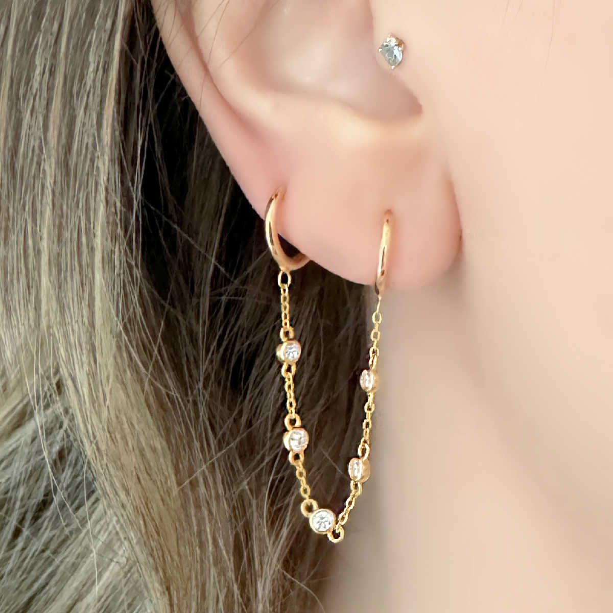 Connected Hoop Earrings, Diamond by the Yard Double Piercing Style on Model