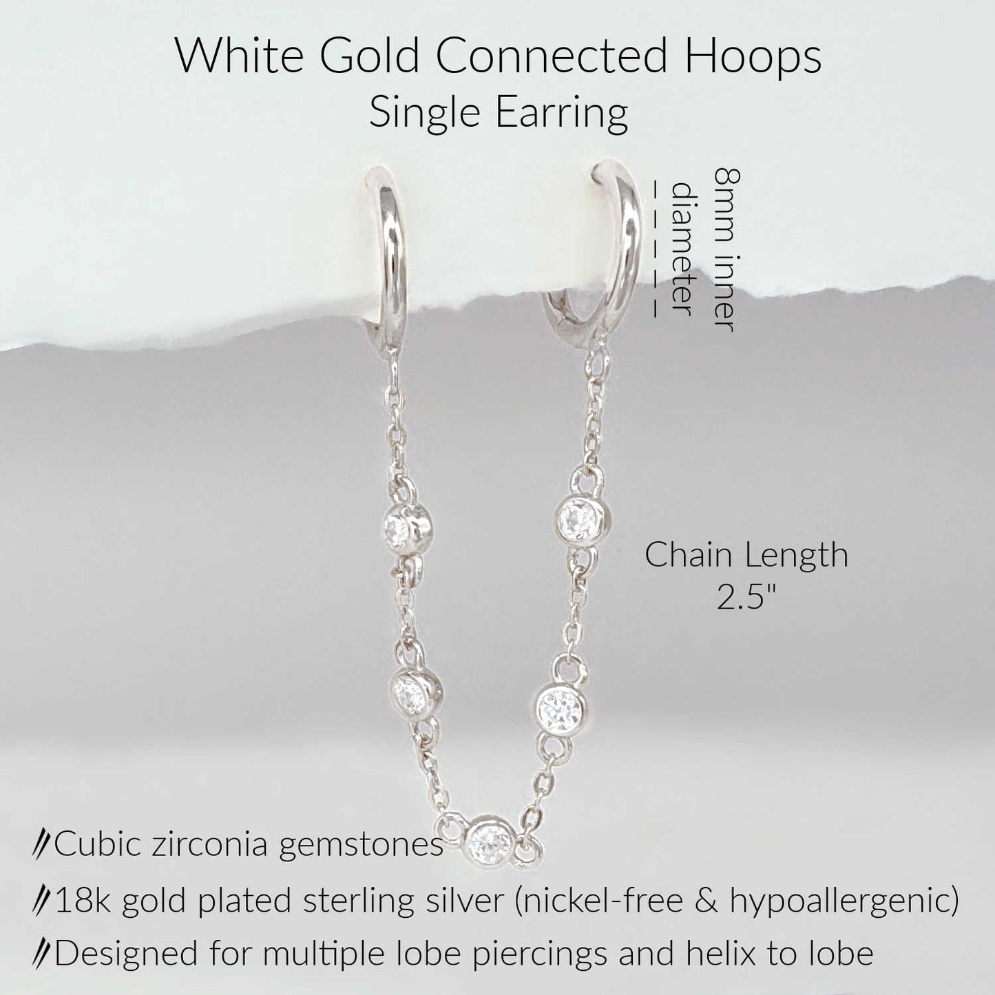 Specs for diamonds by the yard double piercing hoops. White gold plated sterling silver chain connected earrings with cubic zirconia gemstones.  2.5" long, 8mm hoops.  Fits double lobe and helix to lobe piercings.