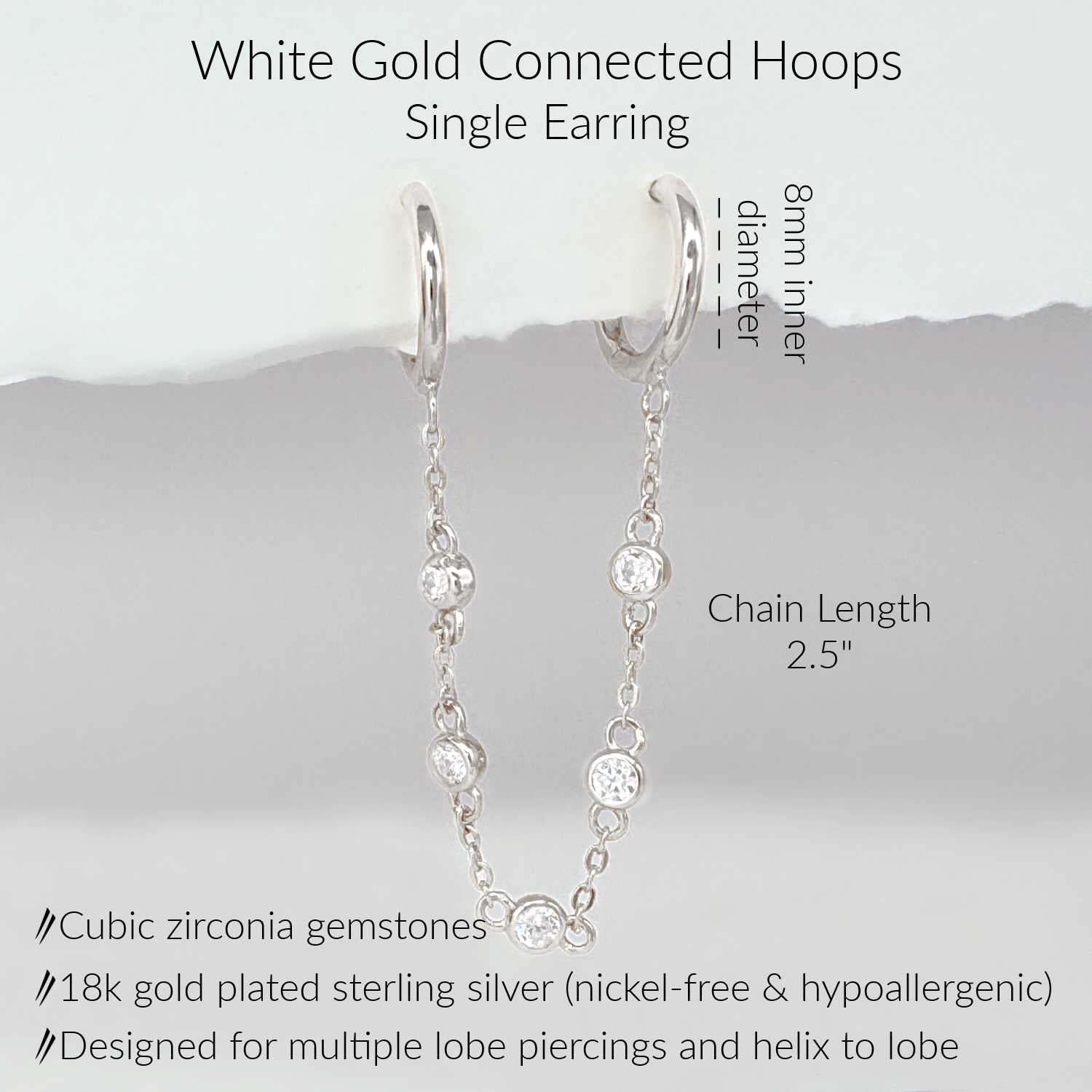 Specs for diamonds by the yard double piercing hoops. White gold plated sterling silver chain connected earrings with cubic zirconia gemstones.  2.5" long, 8mm hoops.  Fits double lobe and helix to lobe piercings.