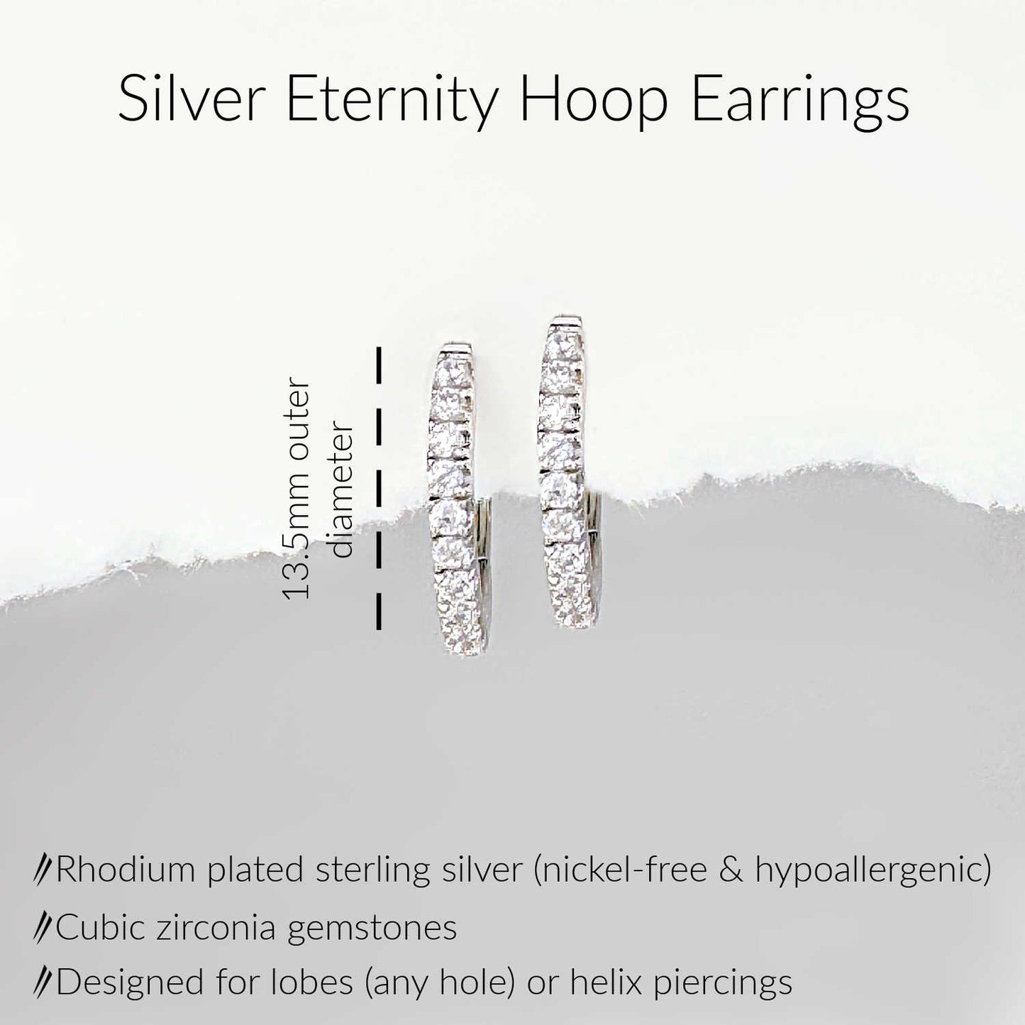 Specs for Silver Eternity Hoop Earrings. Cubic zirconia gemstones on 13.5mm hinged huggie. 925 sterling silver