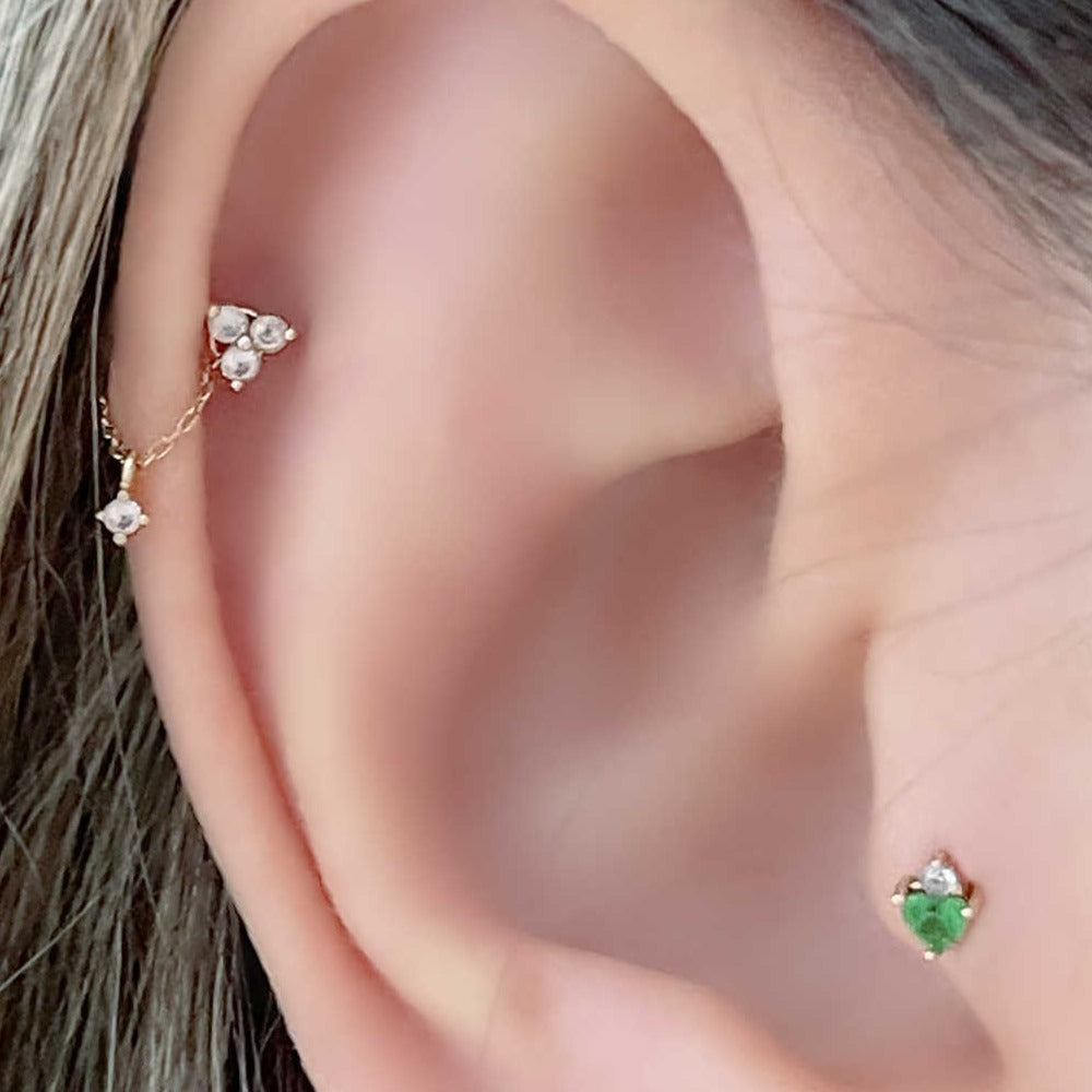 Green Tsavorite & White Sapphire Tragus Earring on Model | Gold Flat Back Cartilage Piercing Studs from Two of Most