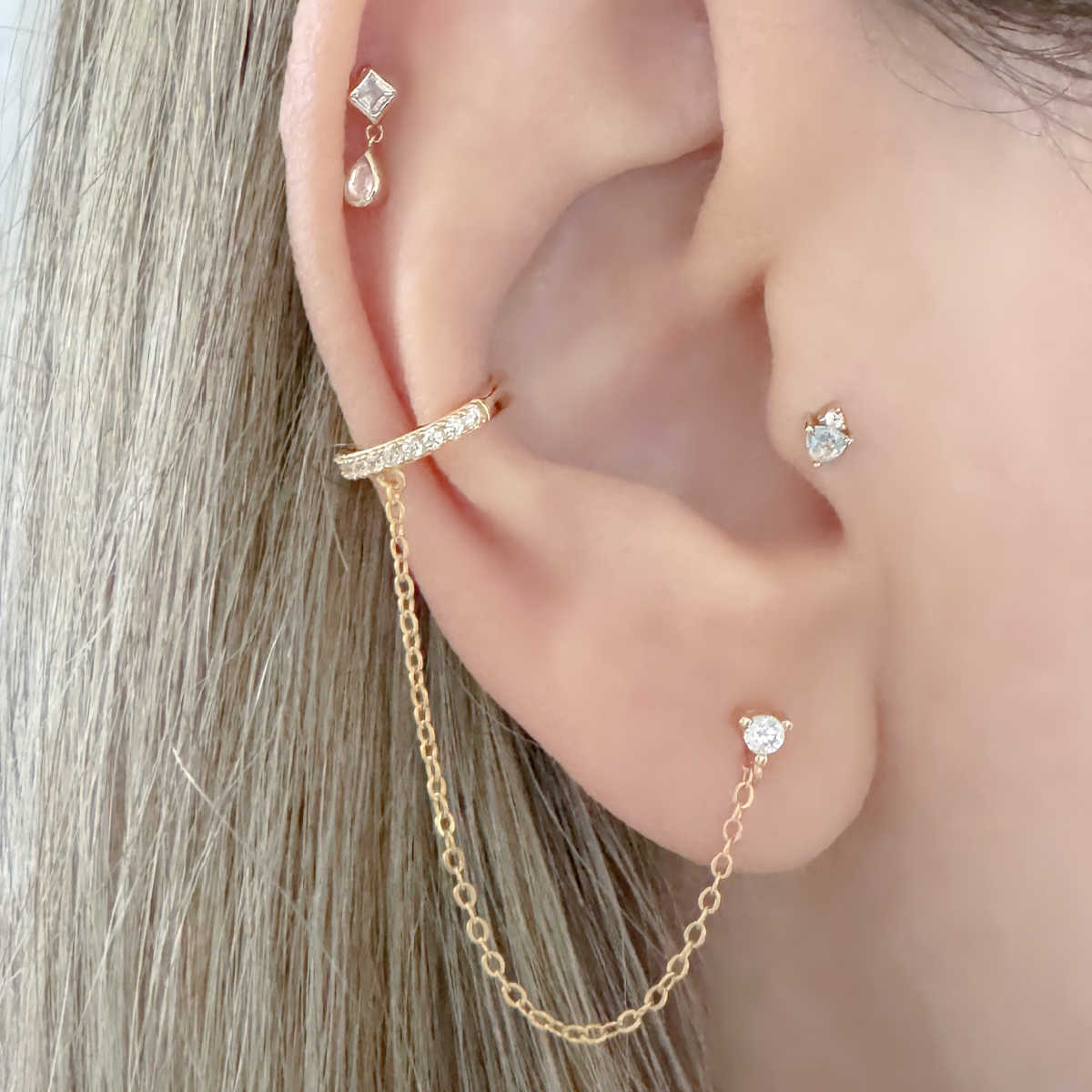 Ear Cuff with Stud | Connected Chain Faux Conch Earring on Model