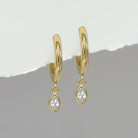 Gold Huggie Earrings with Charm | Cubic Zirconia Dangle Hoops from Two of Most