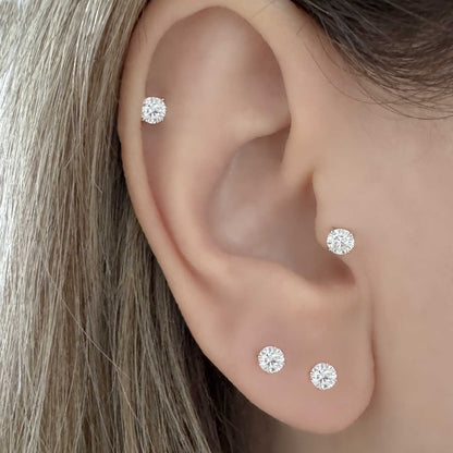 Woman Wearing Lab Grown Diamond Stud Earrings in Helix, Tragus & Lobe | 14k White Gold Flat Back Cartilage Piercing Studs from Two of Most