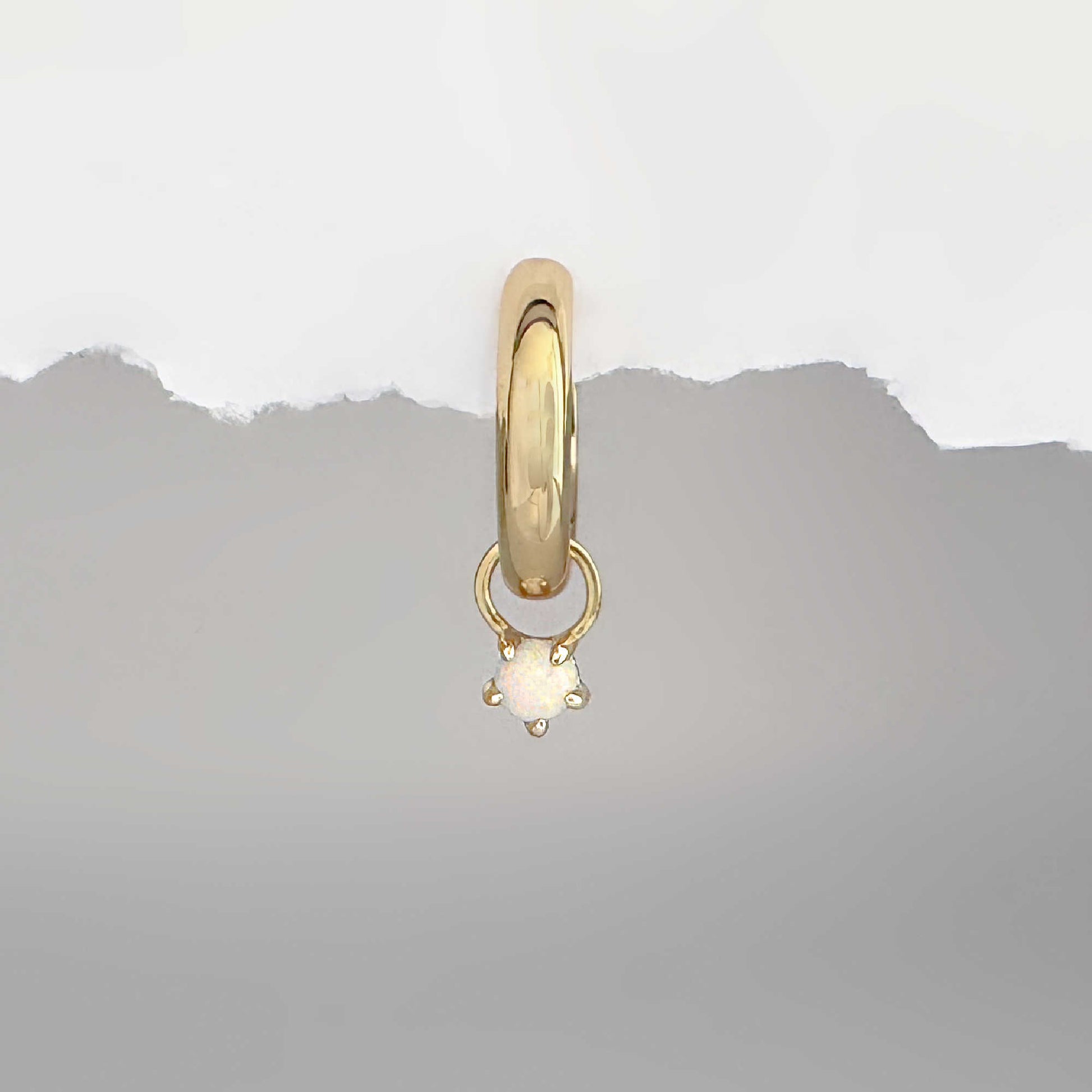 Gold hoop earring with a round opal removable earring charm