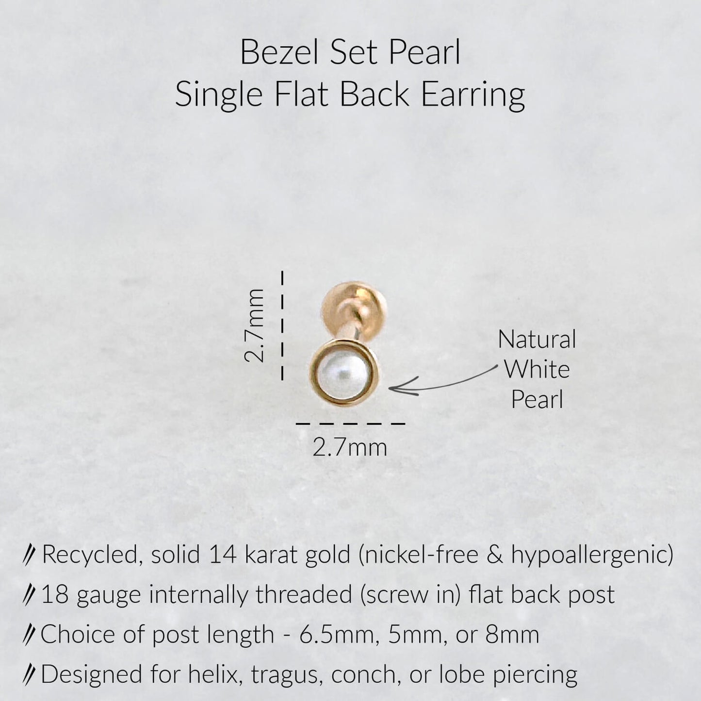 A single bezel set pearl earring with a flat back. The earring features a natural white pearl set in a gold bezel. The post is 18 gauge internally threaded and available in 6.5mm, 5mm, or 8mm lengths. The earring is designed for helix, tragus, conch, or lobe piercings and is made of recycled, solid 14 karat gold.