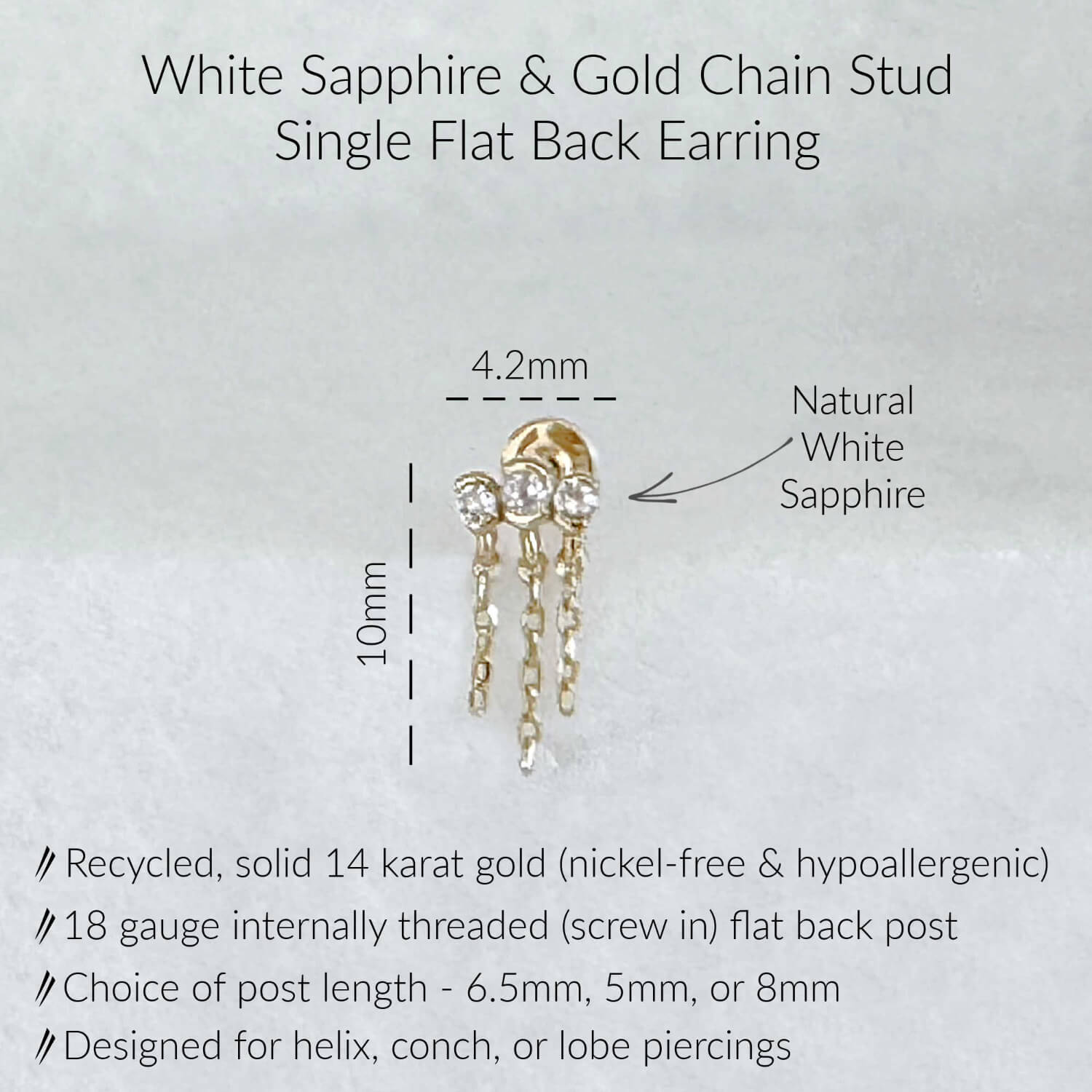 Specs for Dangling Chain Helix Earring in 14k Gold with White Sapphires. Description includes 10mm x 4.2mm dimensions, 18 gauge internally threaded screw back post with choice of post length. Made from recycled, nickel-free, hypoallergenic gold