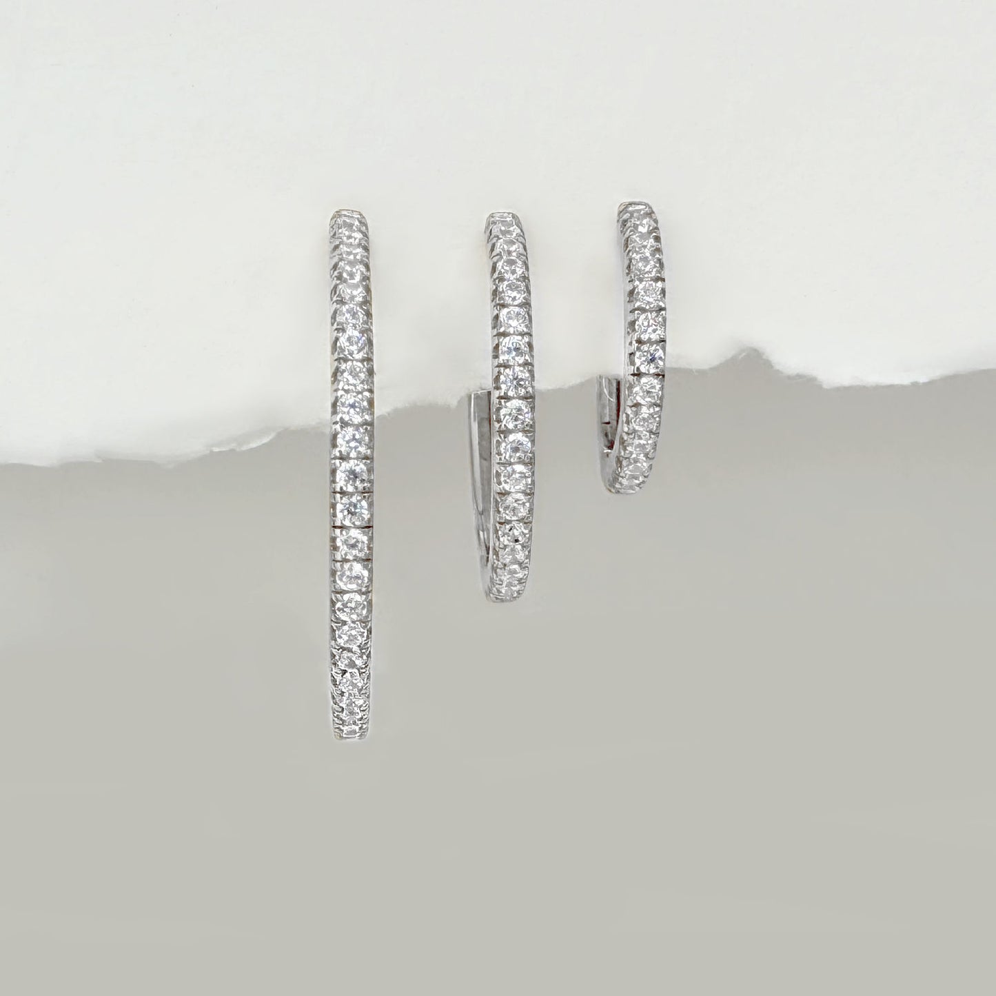 Gift set of 3 pairs of graduated sterling silver hoop eternity earrings with cubic zirconia gemtones