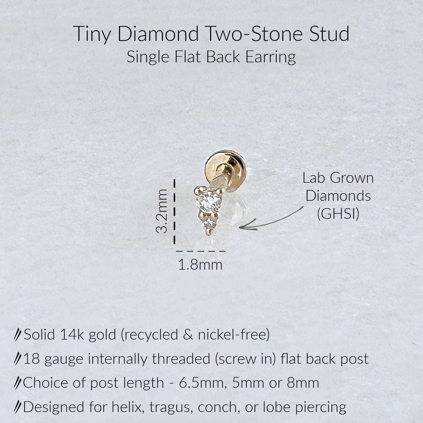 A product information graphic for a Tiny Diamond Two-Stone Stud single flat back earring. The image shows a small gold earring with a diamond gemstone, accompanied by text detailing its features: solid 14k yellow gold, 18 gauge flat back, and GHSI lab grown diamonds.