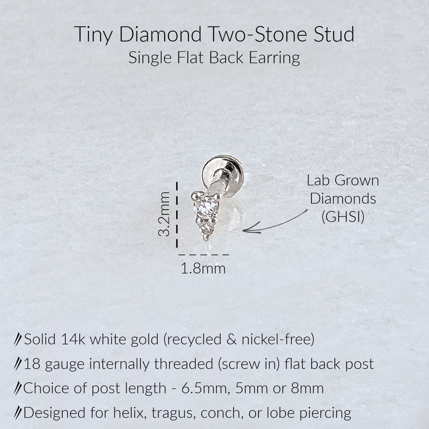A product information graphic for a Tiny Diamond Two-Stone Stud single flat back earring. The image shows a small white gold earring with a diamond gemstone, accompanied by text detailing its features: solid 14k white gold, 18 gauge flat back, and GHSI lab grown diamonds.