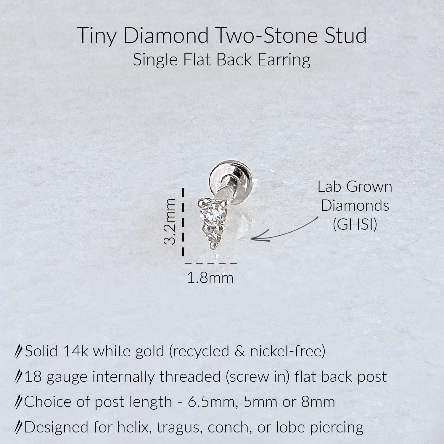 A product information graphic for a Tiny Diamond Two-Stone Stud single flat back earring. The image shows a small white gold earring with a diamond gemstone, accompanied by text detailing its features: solid 14k white gold, 18 gauge flat back, and GHSI lab grown diamonds.