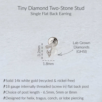 A product information graphic for a Tiny Diamond Two-Stone Stud single flat back earring. The image shows a small white gold earring with a diamond gemstone, accompanied by text detailing its features: solid 14k white gold, 18 gauge flat back, and GHSI lab grown diamonds.