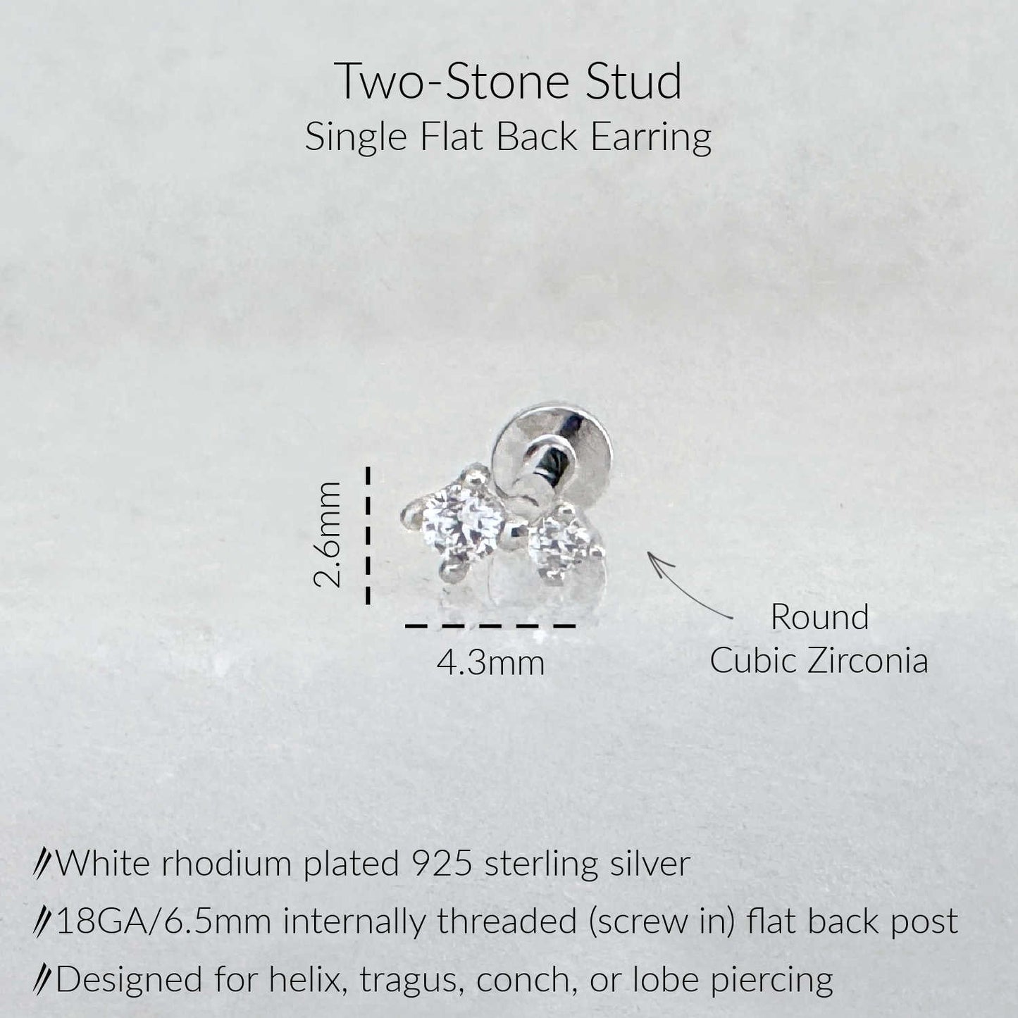 A product diagram for a two-stone stud earring, showing a silver flat back stud with two clear cubic zirconia stones and dimension labels of 2.6mm width and 4.3mm height.