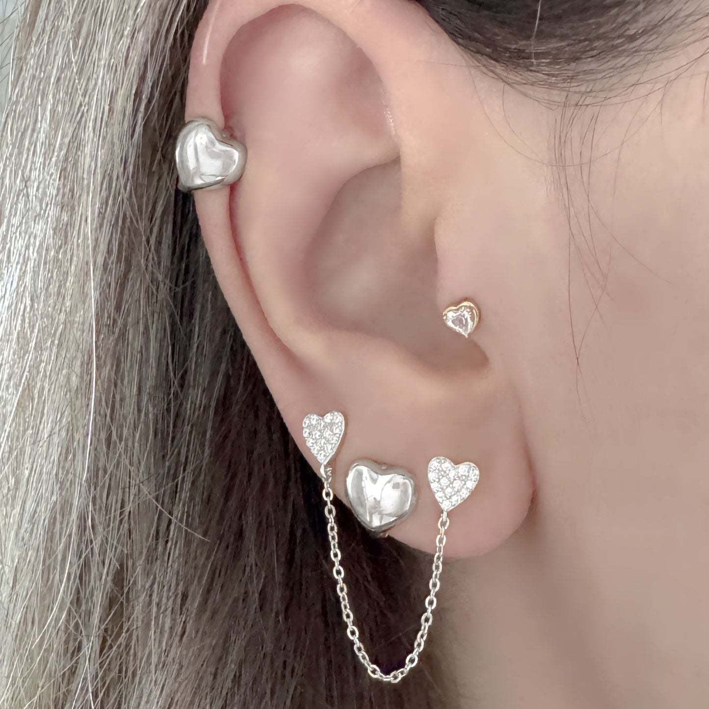 White Gold Heart Hoop and Stud Earrings on Model, Two of Most Fine Jewelry