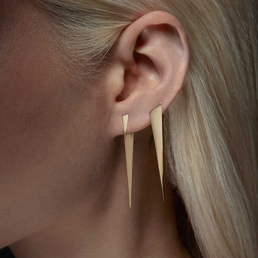 Spike stud mismatched earrings on model | push back | 14k yellow gold | Two of Most