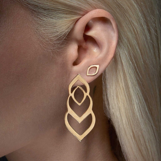 Triple Loop gold stud statement mismatched earrings on model | push back | 14k yellow gold | Two of Most